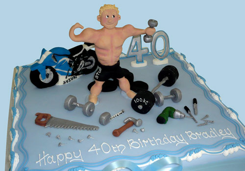 A 40th Birthday Cake with a weightlifter on